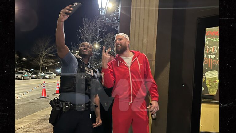 Travis Kelce Will take Image at Cafe with Cop Immediately after Kansas City Parade Capturing